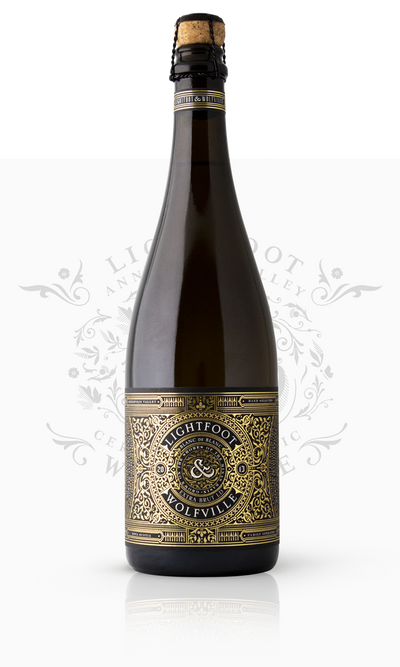Bottle of Highfoot & Wolfville wine on a white background